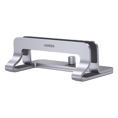 Soporte Vertical para Laptop / Ajustable 12-26 mm / Aluminio y Silicona / Hasta 15.6 pulgadas / Base Antideslizante / Color Plata
